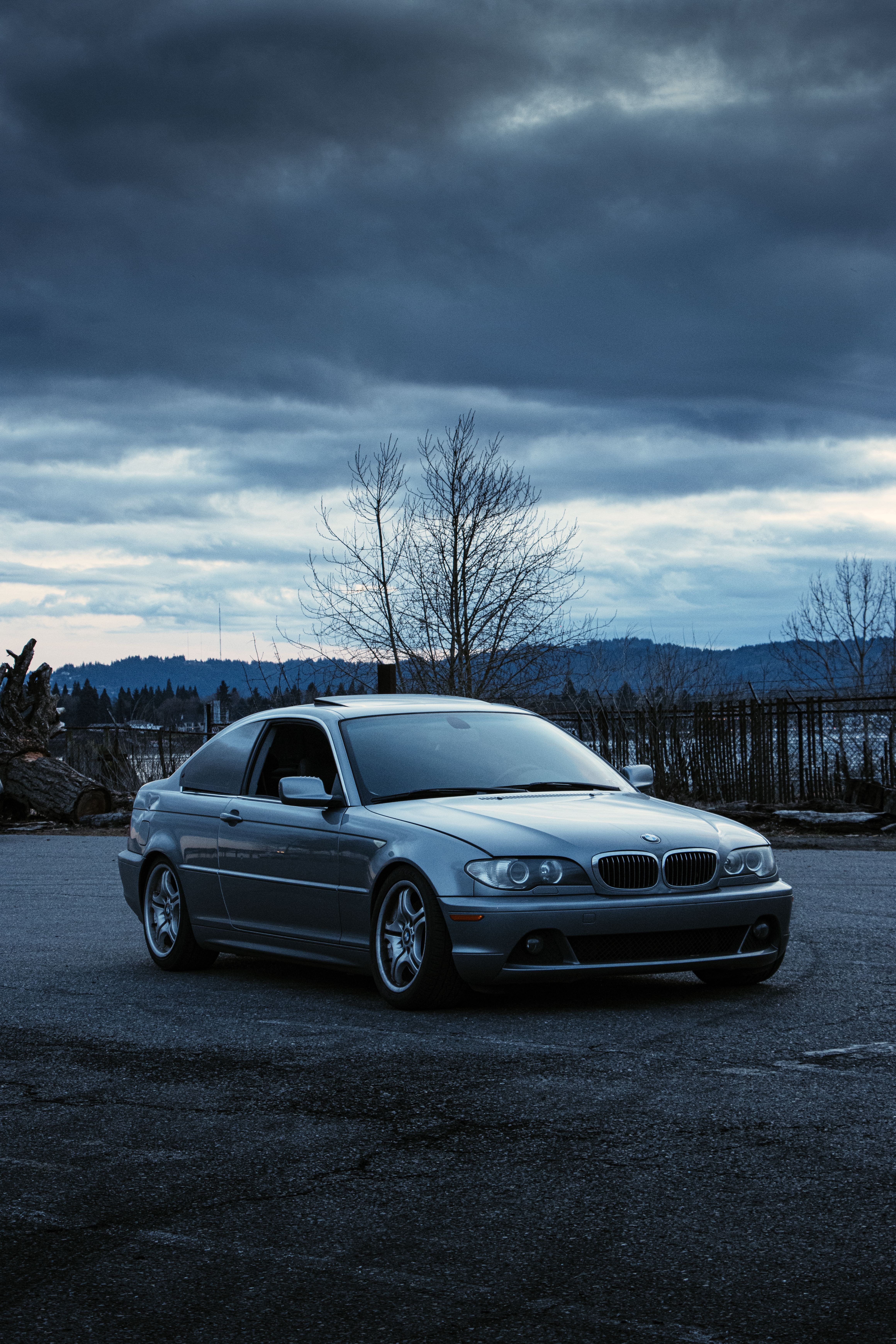 BMW E46 parked in front of mountains