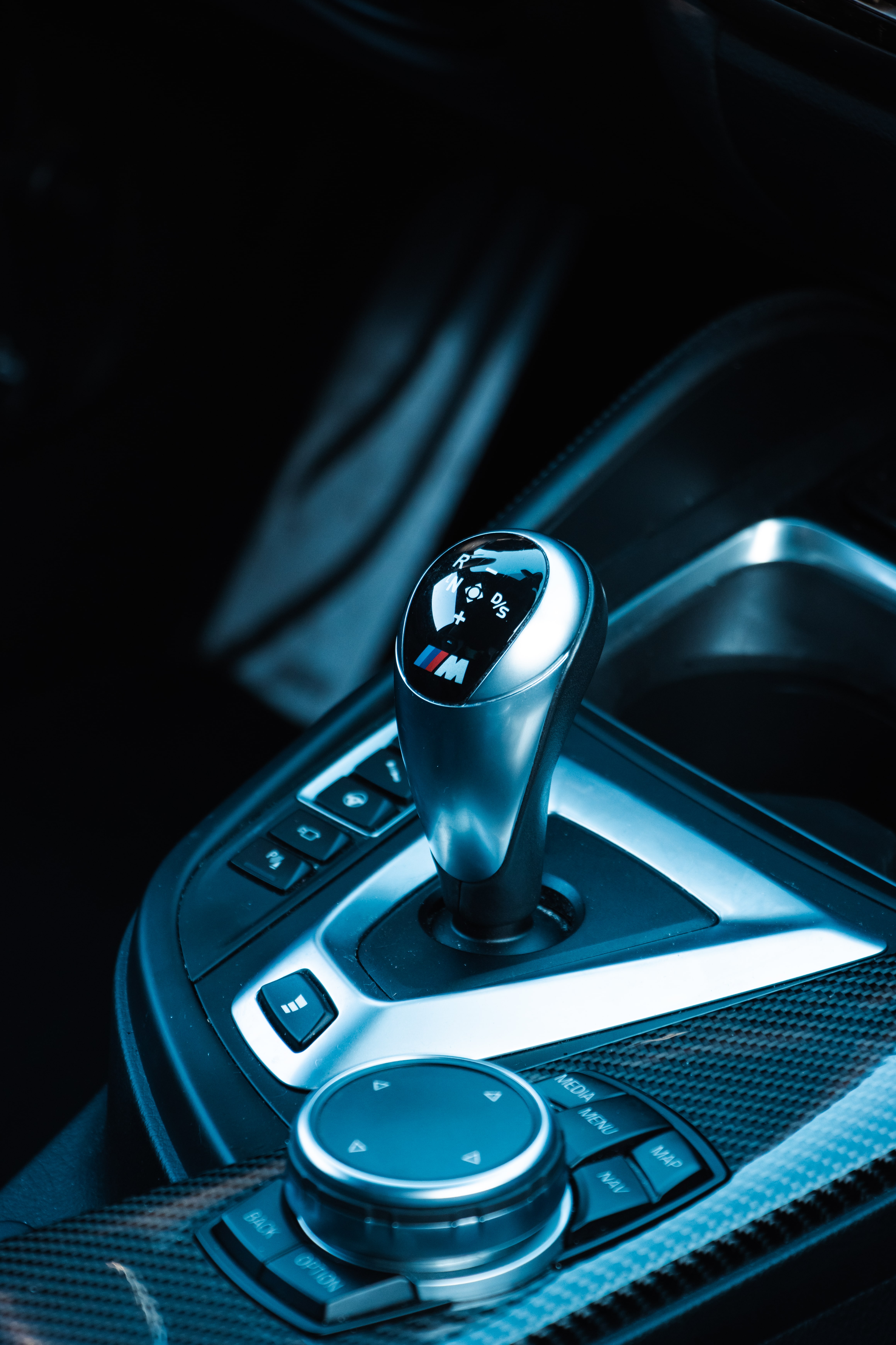 Interior of BMW M4 showing shifter and controls